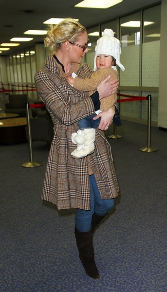 Katherine Heigl in plaid coat