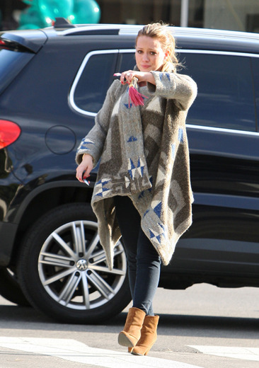 Hilary Duff cries as she goes to visit her ill dog