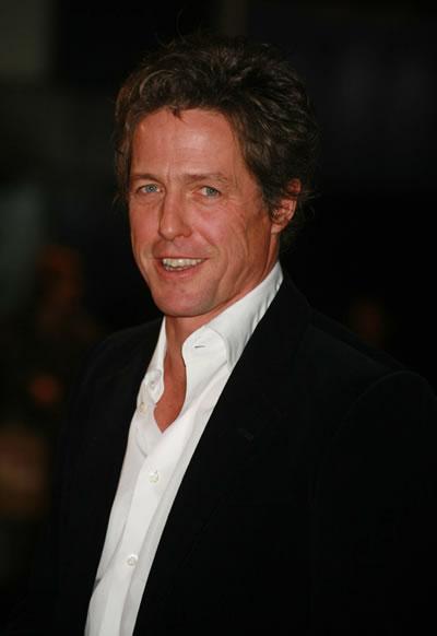 Hugh Grant attends the world premiere of 'The Golden Compass.'