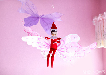 Elfie rides a butterfly