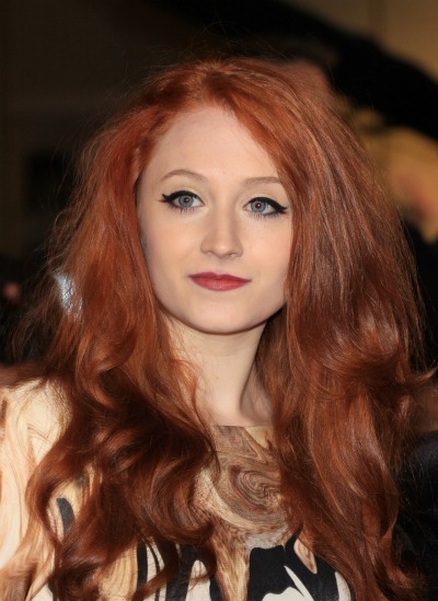Janet Devlin's long, bright red waves 