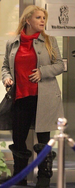 Jessica Simpson in red turtleneck
