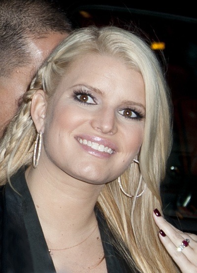 Jessica Simpson with large diamond hooops
