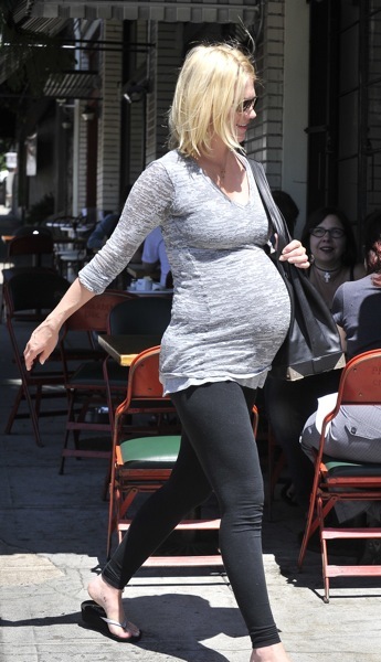 January Jones in black tights