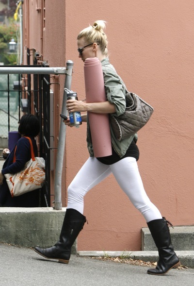 January Jones in lace-up boots