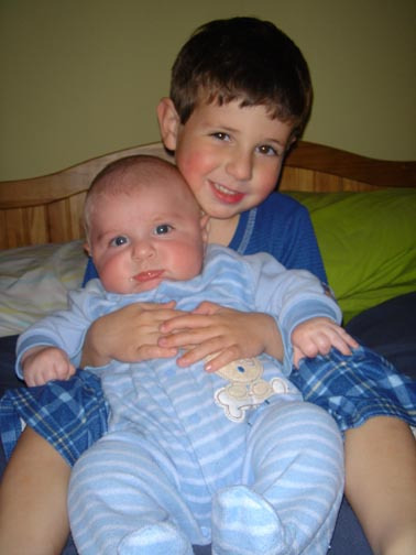 Julien (4 years old) with Simon (6 months old)