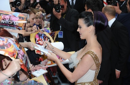 Katy Perry signs autograph at her UK premeire