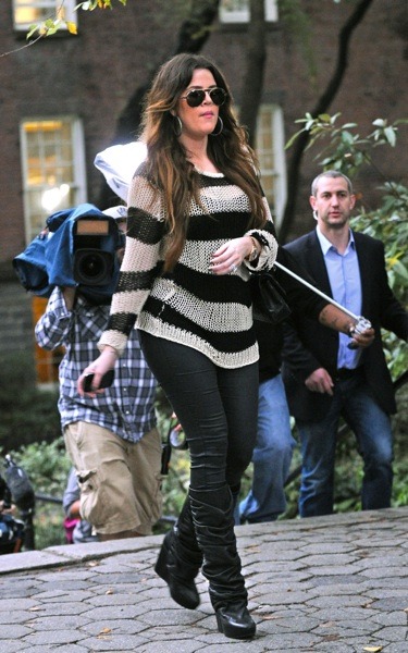 Khloe Kardashian in black pants