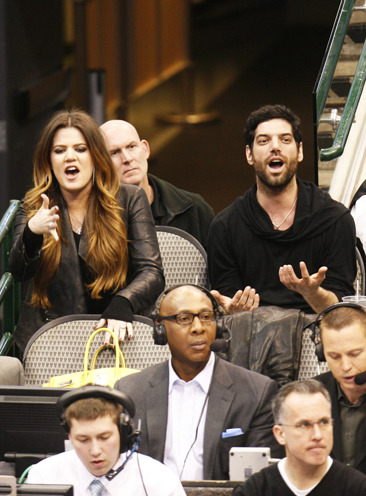 Khloe Kardashian cheering on Lamar Odom
