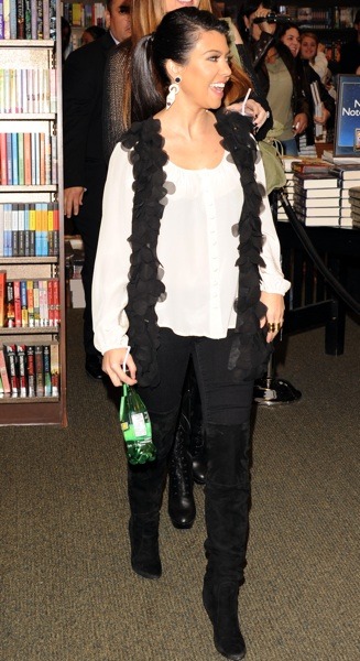 Kourtney Kardashian in white silk