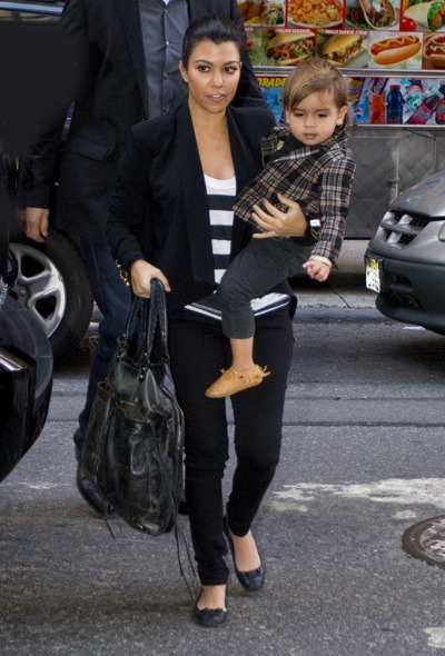 Kourtney Kardashian in cropped jacket