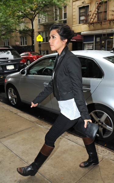 Kourtney Kardashian in two-toned boots