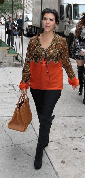 Kourtney Kardashian in orange