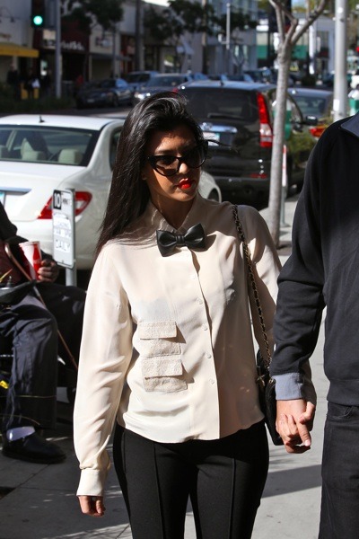 Kourtney Kardashian in a bow-tie