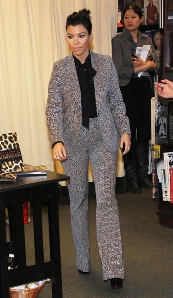 Kourtney Kardashian in a patterned suit