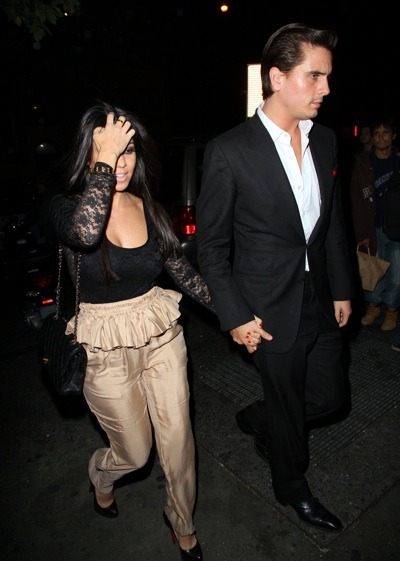 Kourtney Kardashian in silk pants