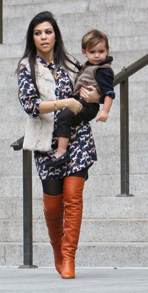 Kourtney Kardashian in thigh highgs