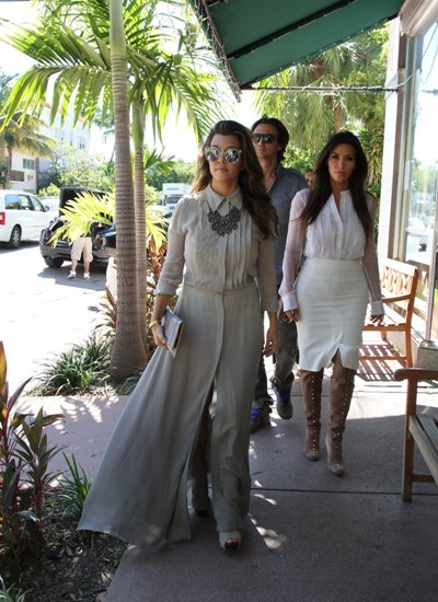Kourtney and Kim walk the streets of Miami