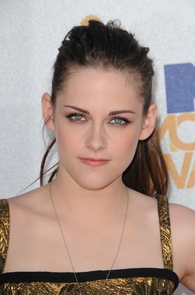 Kristen Stewart with a messy ponytail