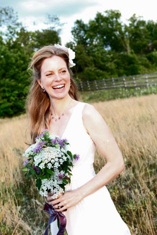Kristin posing with her bouquet