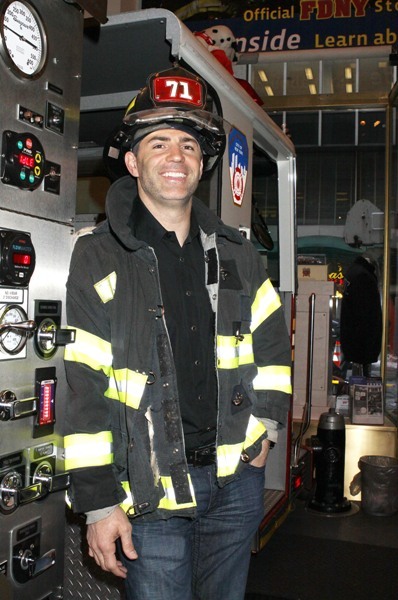Kurt Warner looking studly in fireman gear