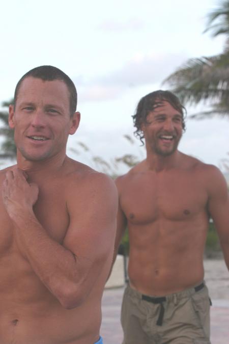 Lance Armstrong and Matthew McConaughey near the water