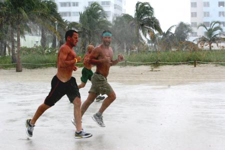 Lance Armstrong and Matthew McConaughey run in the rain