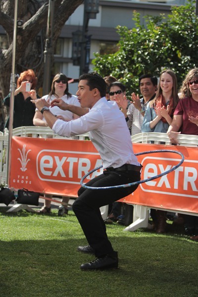 Mario Lopez hula hoops
