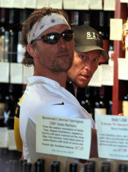 Matthew McConaughey and Lance Armstrong look out the window