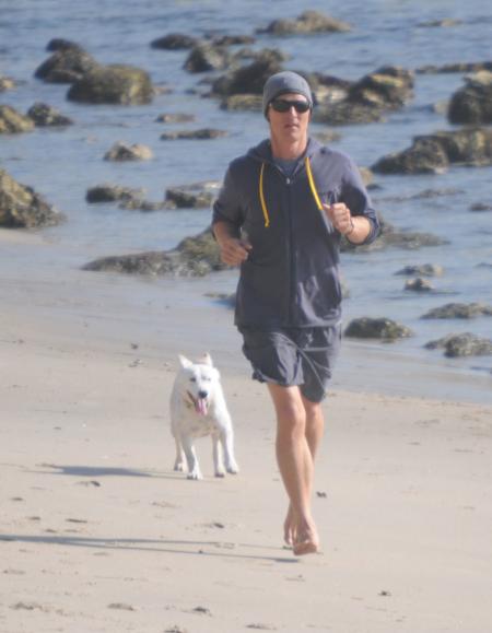 Matthew McConaughey jogs with his dog