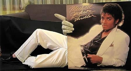  Michael Jackson holding his Thriller album cover