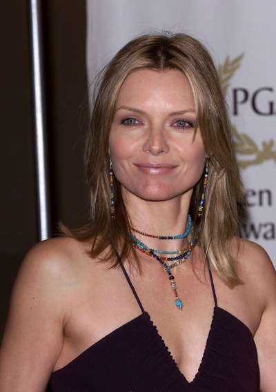 Michelle Pfeiffer with turqouise accessories