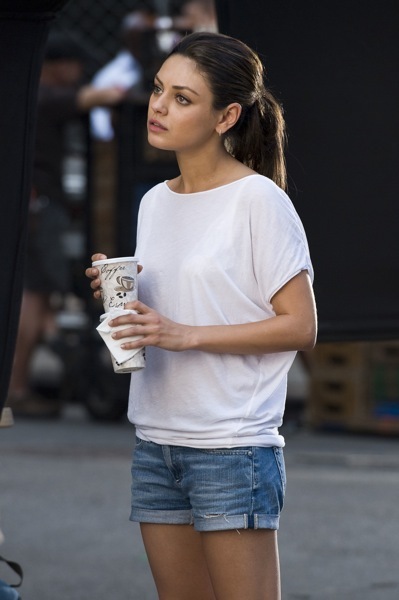 Mila Kunis in a white top