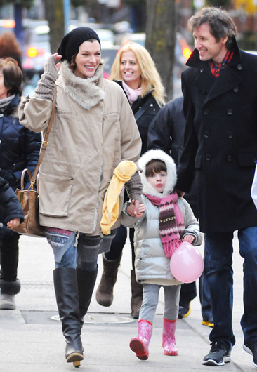 Mila Jovovich attends a Santa parade in Toronto