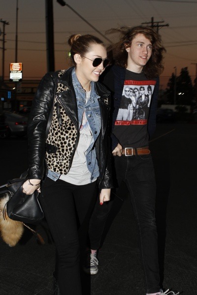 Miley Cyrus in animal print jacket