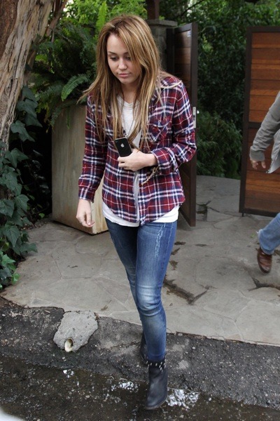 Miley Cyrus in red plaid shirt