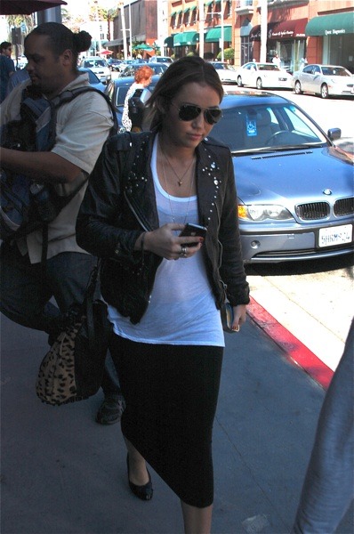 Miley Cyrus in motorcycle jacket