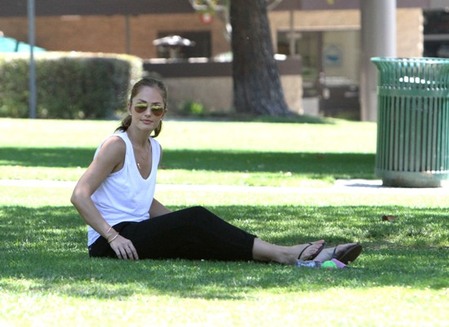 Minka Kelly plays with her dog Chewy at Coldwater Canyon Park