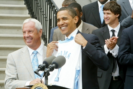Barack Obama stands for the UNC Tar Heels