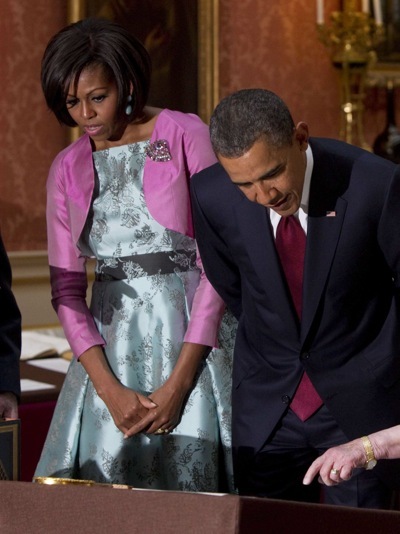 Michelle Obama in a lilac jacket