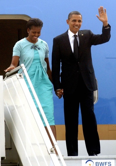 Michelle Obama in a turquoise cardigan
