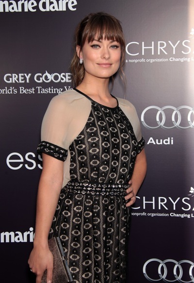 Olivia Wilde in belted dress