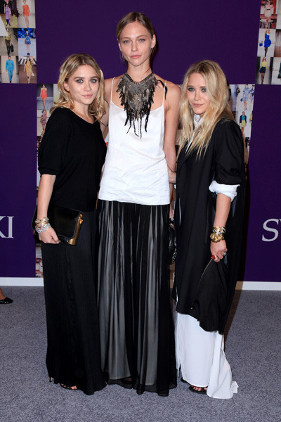 Ashley and Mary-Kate Olsen pose with Sasha Pivovarova at the 2010 CFDA Fashion Awards in NYC. Photo courtesy of Andres O