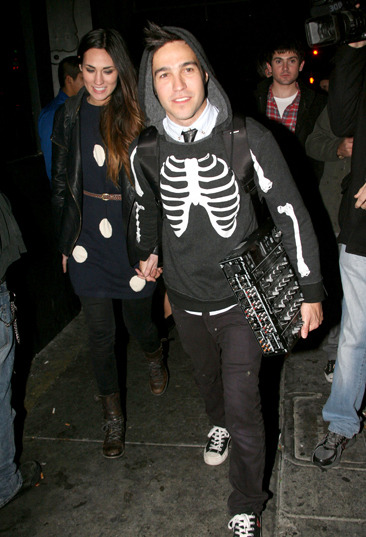 Pete Wentz and his girlfriend leaving a bar