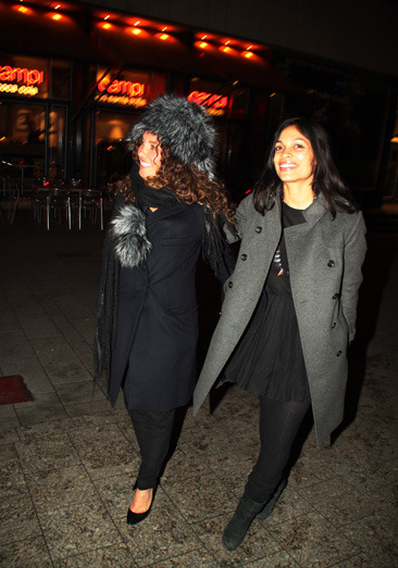 Rosario Dawson and a friend leaving a restaurant in Germany