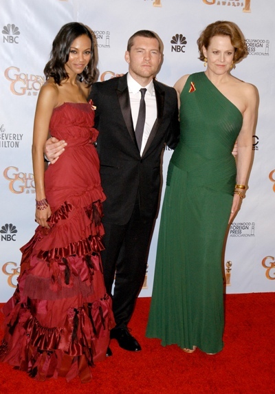 Sam Worthington with Zoe Saldana and Sigourney Weaver at the Golden Globes