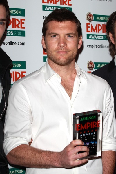 Sam Worthington collecting Best Film award for Avatar