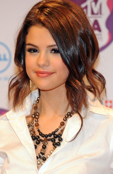 Selena Gomez with a bold necklace