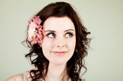 Layered Waves and Spiral Curls with Flower Accent