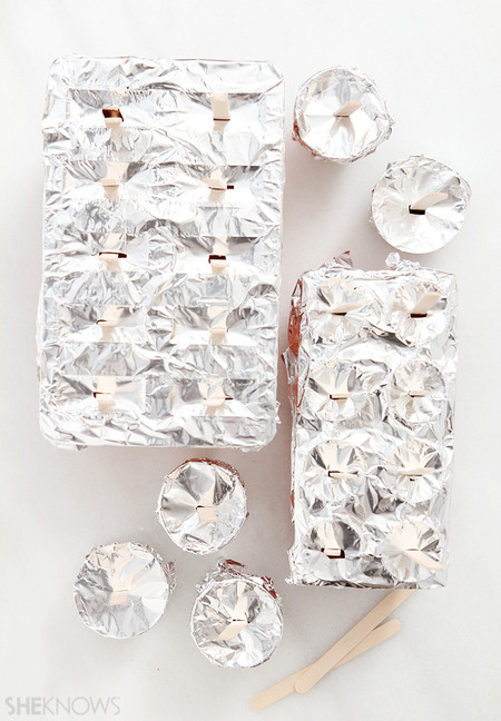 Add popsicle sticks and freeze